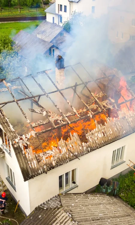 aerial-view-of-a-house-on-fire-with-orange-flames-2026-01-07-00-44-33-utc